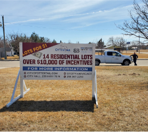 Lots for sale sign.