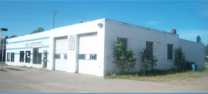 An old photograph of an automotive garage.